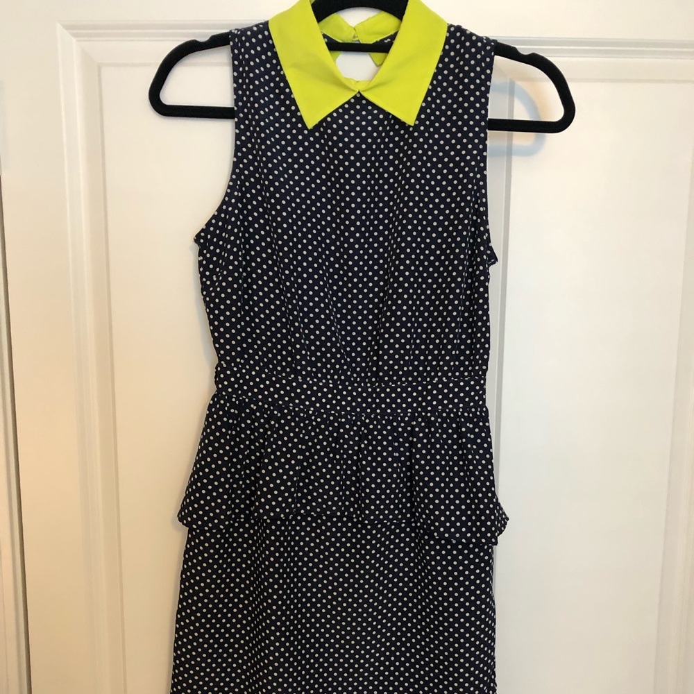 Navy polka dot peplum dress